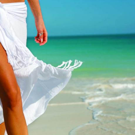Woman Walking on the Beach