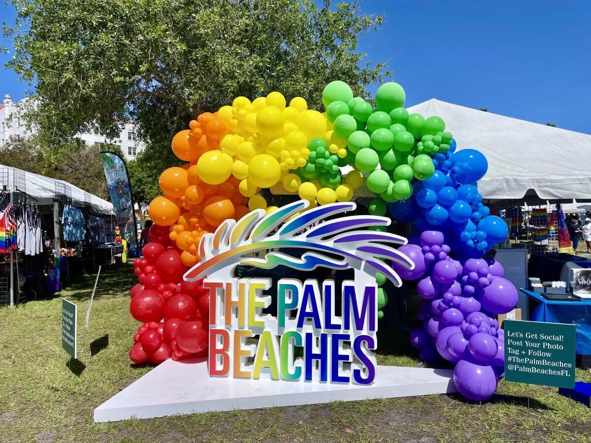 The Palm Beaches rainbow logo