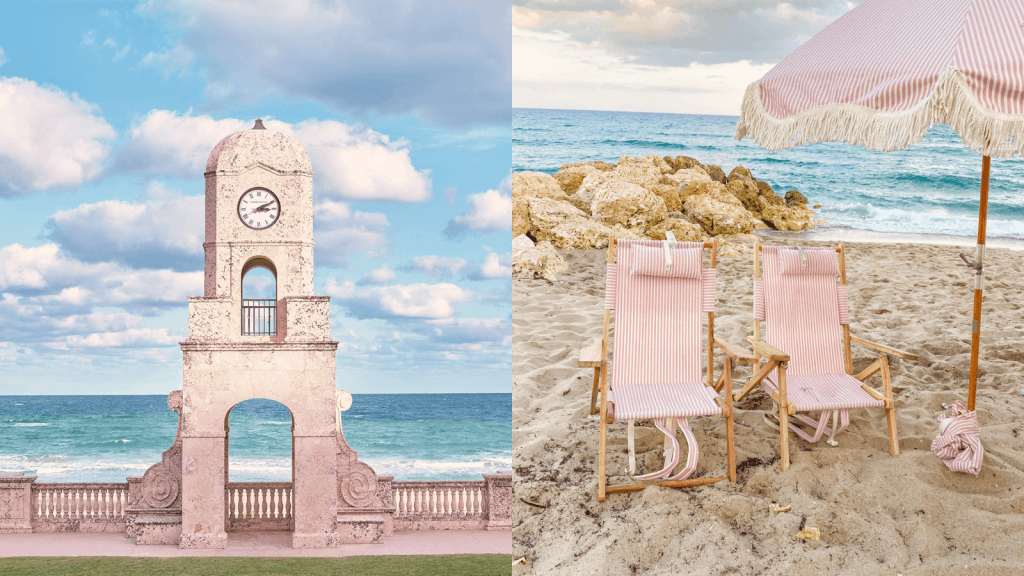 A picturesque beach scene with two pink striped deck chairs and a matching umbrella on soft sand, overlooking the ocean with rocky outcrops and a historic clock tower in the distance