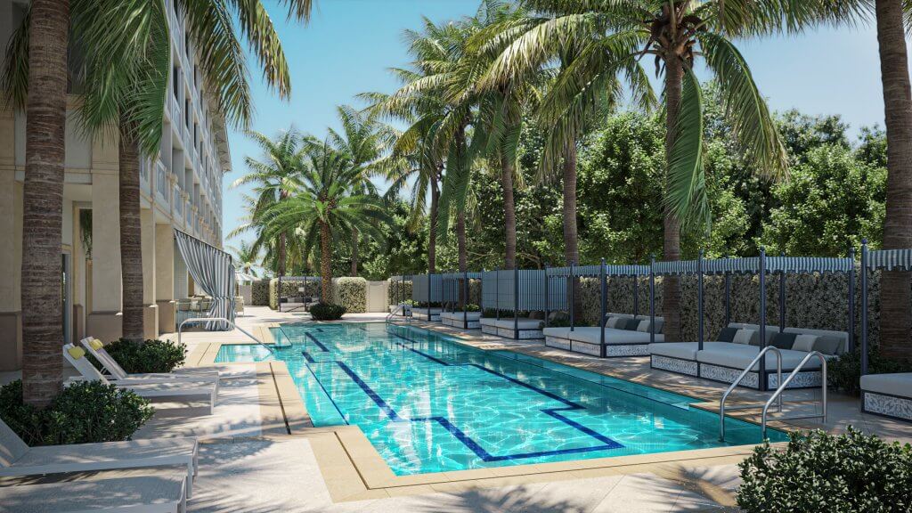 Une oasis de sérénité au bord de la piscine avec des palmiers, des chaises longues et un bâtiment moderne en arrière-plan.