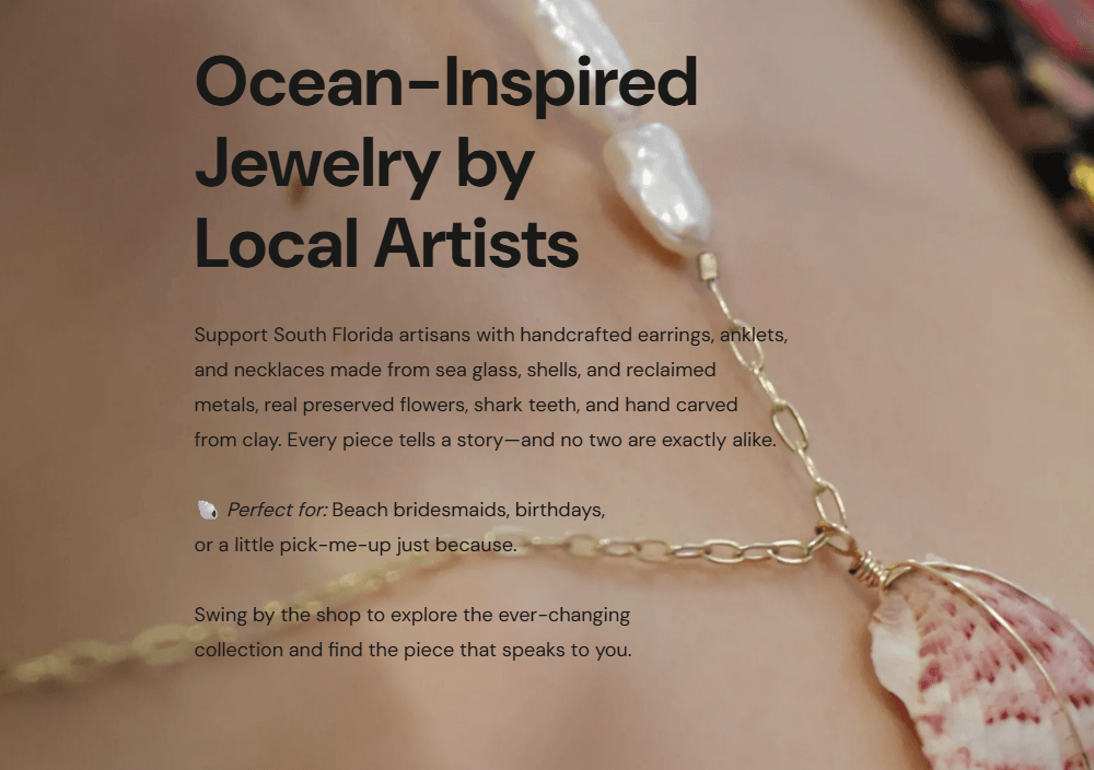 A close-up of a shell necklace with text advertising ocean-inspired jewelry by local artists