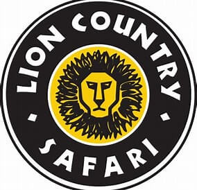 The circular logo for Lion Country Safari featuring a stylized lion head