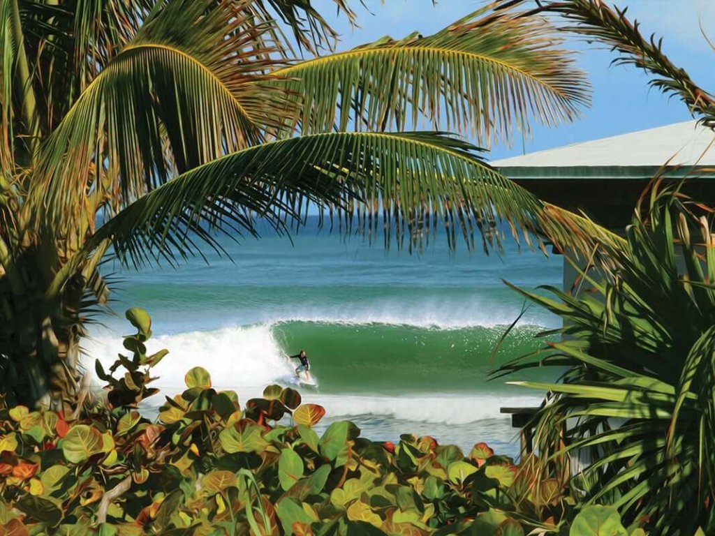 a person surfing on a wave